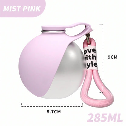 A pink and silver spherical water bottle with a carrying loop, shown on a white background with dimension labels (8.7CM, 9CM) and a 285ML capacity label.