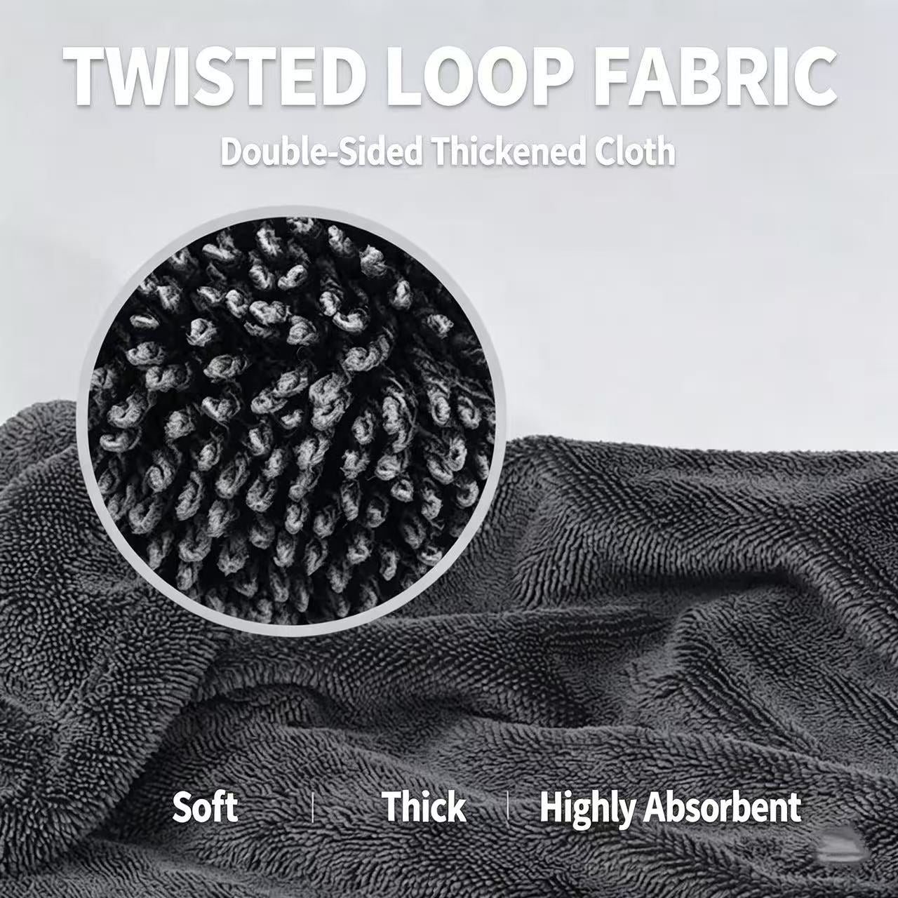Dark gray twisted loop fabric shown draped with a circular close-up inset highlighting the thick, textured fibers. White text at the top reads 'TWISTED LOOP FABRIC' and 'Double-Sided Thickened Cloth,' with 'Soft | Thick | Highly Absorbent' at the bottom.