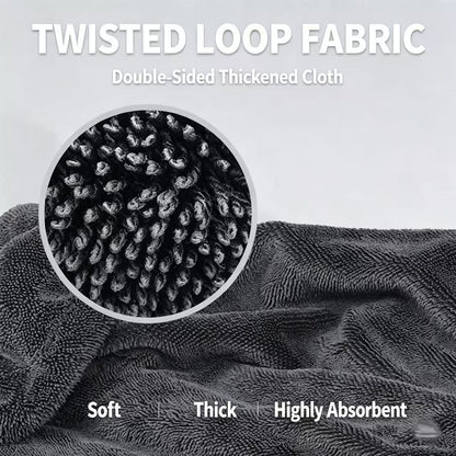 Dark gray twisted loop fabric shown draped with a circular close-up inset highlighting the thick, textured fibers. White text at the top reads 'TWISTED LOOP FABRIC' and 'Double-Sided Thickened Cloth,' with 'Soft | Thick | Highly Absorbent' at the bottom.